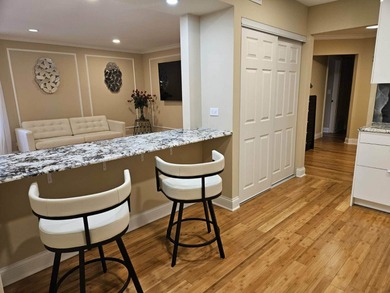 Bright Chateau unit with large rooms and beautiful lake views