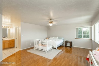 Beautiful split-level ranch perched atop a hill in a serene and