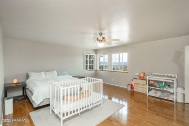 Beautiful split-level ranch perched atop a hill in a serene and