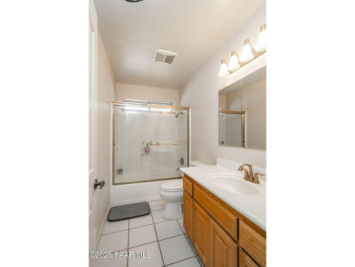 Beautiful split-level ranch perched atop a hill in a serene and