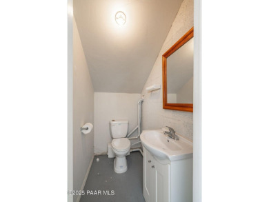 Beautiful split-level ranch perched atop a hill in a serene and