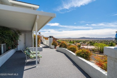 Beautiful split-level ranch perched atop a hill in a serene and