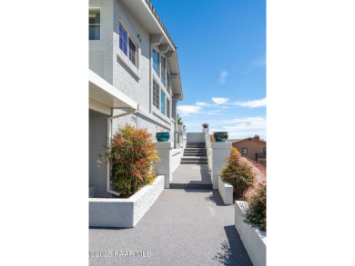 Beautiful split-level ranch perched atop a hill in a serene and