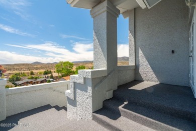 Beautiful split-level ranch perched atop a hill in a serene and