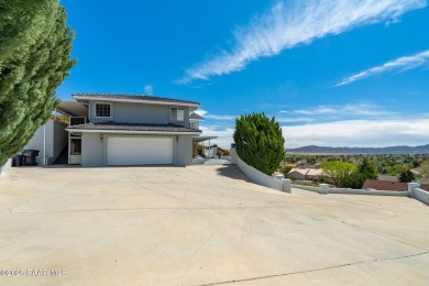 Beautiful split-level ranch perched atop a hill in a serene and