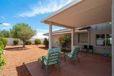 Beautiful split-level ranch perched atop a hill in a serene and