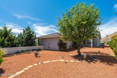 Beautiful split-level ranch perched atop a hill in a serene and
