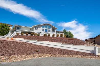 Beautiful split-level ranch perched atop a hill in a serene and