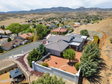 Beautiful split-level ranch perched atop a hill in a serene and