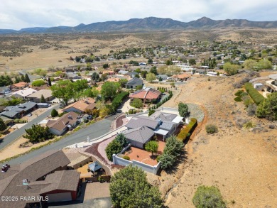 Beautiful split-level ranch perched atop a hill in a serene and
