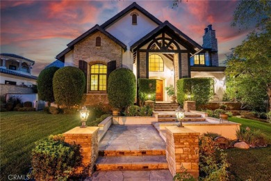 Among the rare custom Westridge Estates perched along the 18th