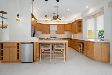 This stunning 3- bedroom,3- bathroom home plus office/den is