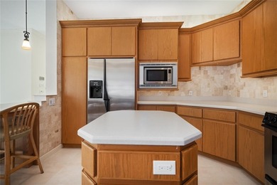 This stunning 3- bedroom,3- bathroom home plus office/den is