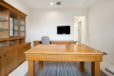 This stunning 3- bedroom,3- bathroom home plus office/den is