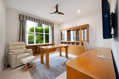 This stunning 3- bedroom,3- bathroom home plus office/den is