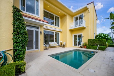 This stunning 3- bedroom,3- bathroom home plus office/den is