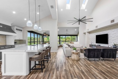 Experience modern elegance in this 4-bedroom, 3-bath condo with