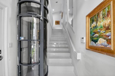 Experience luxury in this renovated 2nd-floor penthouse located