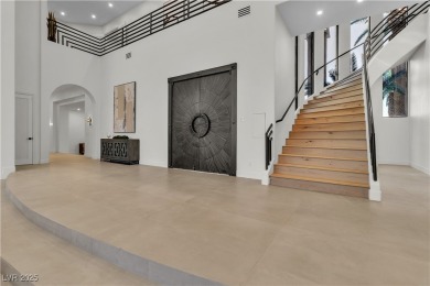 WELCOME TO THIS NEARLY 12,000sqft CUSTOM HOME WITHIN THE GUARD