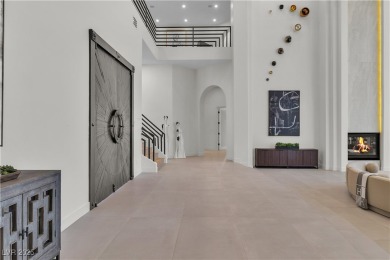 WELCOME TO THIS NEARLY 12,000sqft CUSTOM HOME WITHIN THE GUARD