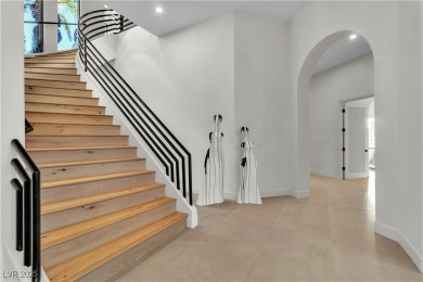 WELCOME TO THIS NEARLY 12,000sqft CUSTOM HOME WITHIN THE GUARD