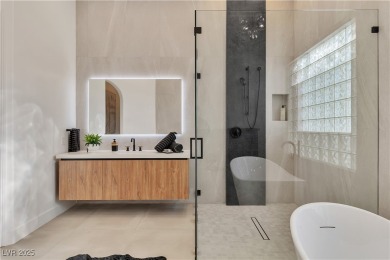 WELCOME TO THIS NEARLY 12,000sqft CUSTOM HOME WITHIN THE GUARD