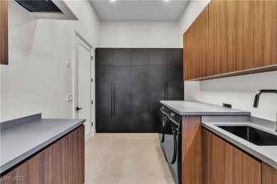 WELCOME TO THIS NEARLY 12,000sqft CUSTOM HOME WITHIN THE GUARD