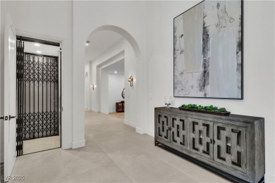 WELCOME TO THIS NEARLY 12,000sqft CUSTOM HOME WITHIN THE GUARD