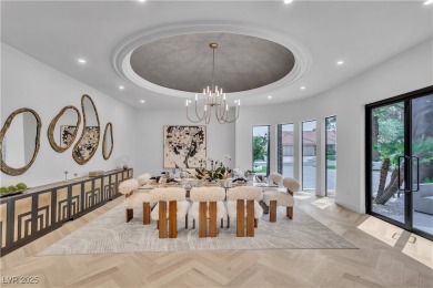 WELCOME TO THIS NEARLY 12,000sqft CUSTOM HOME WITHIN THE GUARD