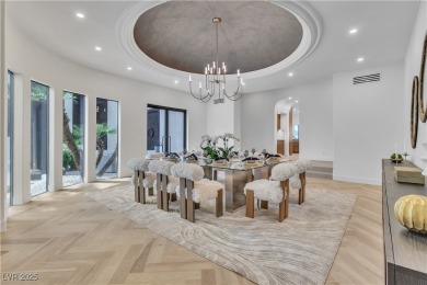 WELCOME TO THIS NEARLY 12,000sqft CUSTOM HOME WITHIN THE GUARD