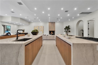 WELCOME TO THIS NEARLY 12,000sqft CUSTOM HOME WITHIN THE GUARD