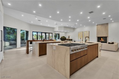 WELCOME TO THIS NEARLY 12,000sqft CUSTOM HOME WITHIN THE GUARD