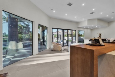 WELCOME TO THIS NEARLY 12,000sqft CUSTOM HOME WITHIN THE GUARD