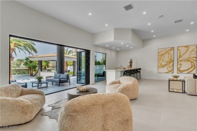 WELCOME TO THIS NEARLY 12,000sqft CUSTOM HOME WITHIN THE GUARD