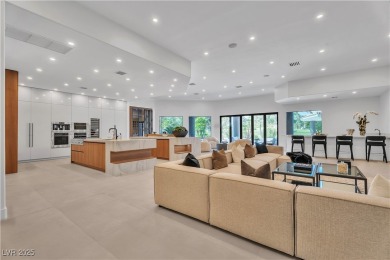 WELCOME TO THIS NEARLY 12,000sqft CUSTOM HOME WITHIN THE GUARD