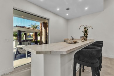 WELCOME TO THIS NEARLY 12,000sqft CUSTOM HOME WITHIN THE GUARD