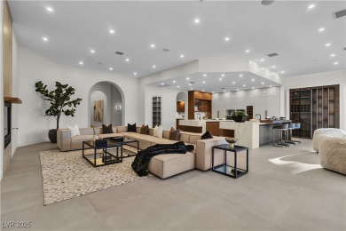 WELCOME TO THIS NEARLY 12,000sqft CUSTOM HOME WITHIN THE GUARD