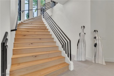 WELCOME TO THIS NEARLY 12,000sqft CUSTOM HOME WITHIN THE GUARD