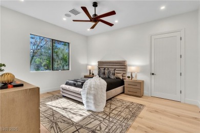 WELCOME TO THIS NEARLY 12,000sqft CUSTOM HOME WITHIN THE GUARD