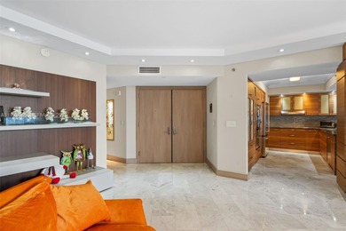 Experience luxurious oceanfront living in this beautifully