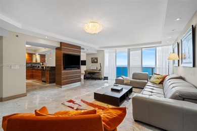 Experience luxurious oceanfront living in this beautifully