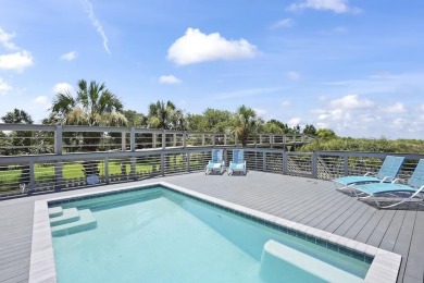 Discover paradise in the custom-built, Gulf-front estate nestled