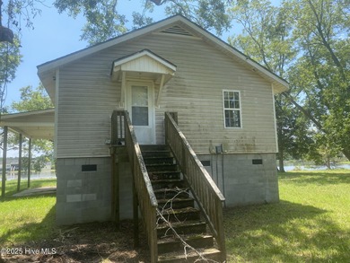 10 Acres Waterfront with Two Homes Bring your vision to this