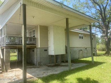 10 Acres Waterfront with Two Homes Bring your vision to this