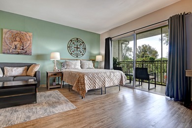 Beautiful top floor unit in a great location. Vinyl plank & tile