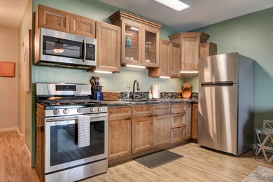 Beautiful top floor unit in a great location. Vinyl plank & tile