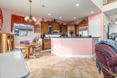 Discover timeless charm in this custom-built lakefront home