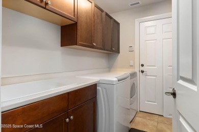 Discover timeless charm in this custom-built lakefront home