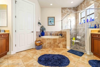 Discover timeless charm in this custom-built lakefront home