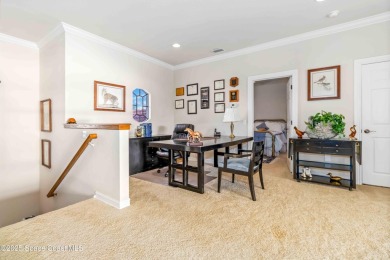 Discover timeless charm in this custom-built lakefront home